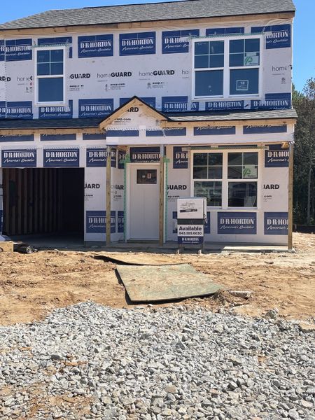 A modern two-story home under construction in Settlement at Salamander by D.R. Horton (North Charleston, SC). A modern two-story home under construction in Settlement at Salamander by D.R. Horton (North Charleston, SC).