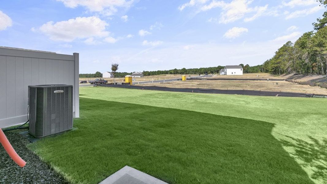 Front exterior of a home in the The Townes at Martin Farms community, located in Aberdeen, NC (Image 12).