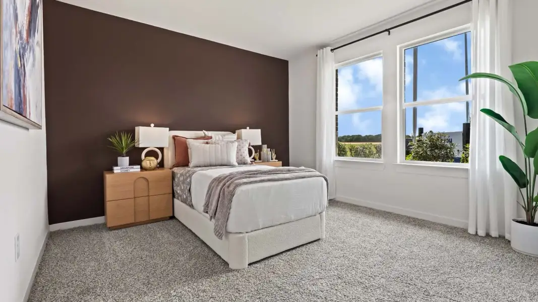 Furnished interior in a model home at Harvest Pointe in Needville (Image 10).