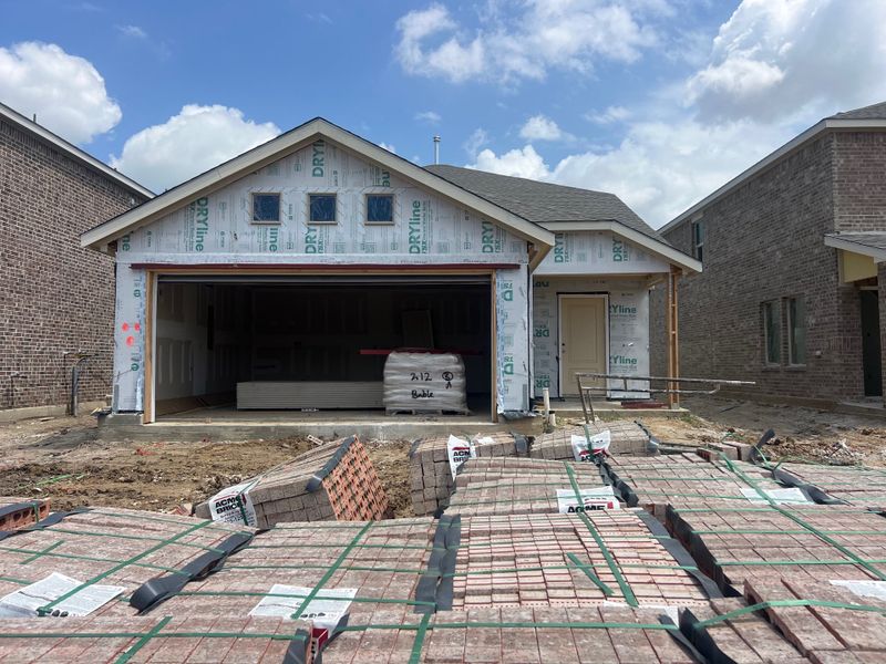 A new construction home in Spiritas Ranch: Brookstone West by Lennar, Little Elm, TX, with materials ready for completion. A new construction home in Spiritas Ranch: Brookstone West by Lennar, Little Elm, TX, with materials ready for completion.