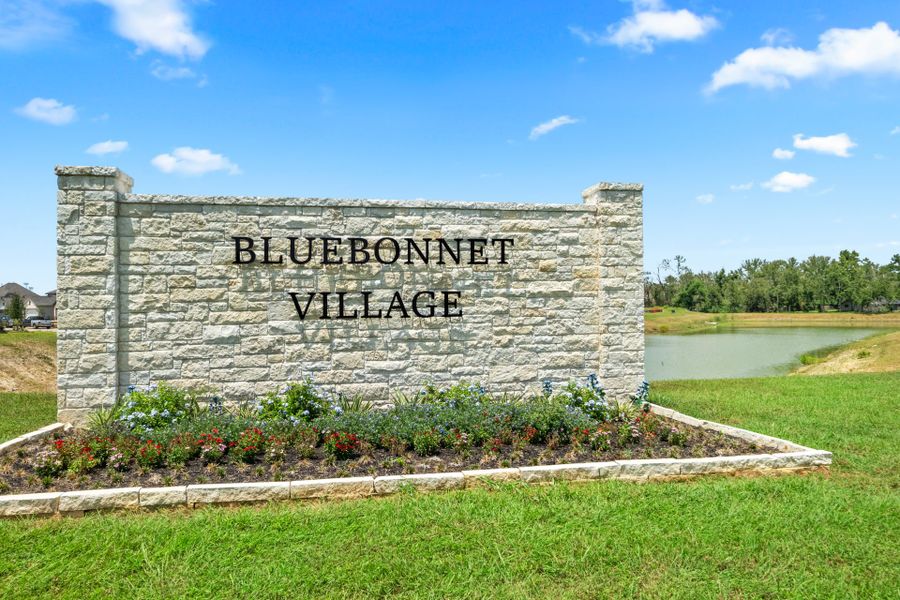 Entrance to the Bluebonnet Village community in Bellville, TX, featuring signage and landscaping (Image 1). Entrance to the Bluebonnet Village community in Bellville, TX, featuring signage and landscaping (Image 1).