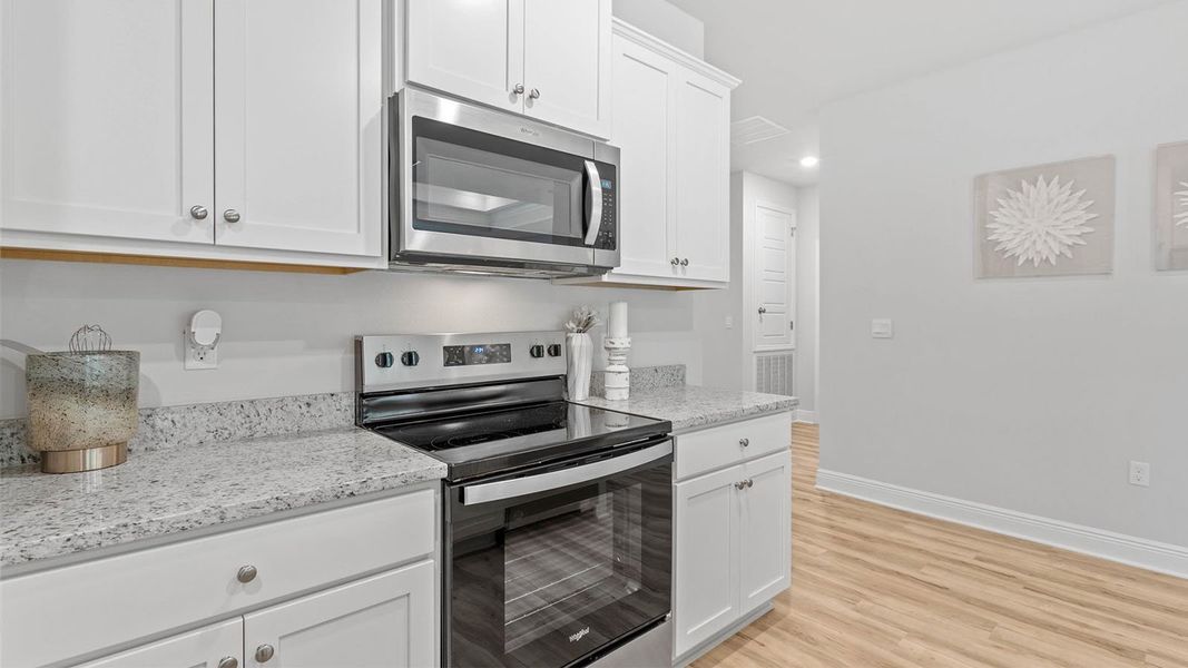 Furnished interior in a model home at Pine Dove Estates in Tallahassee (Image 11).
