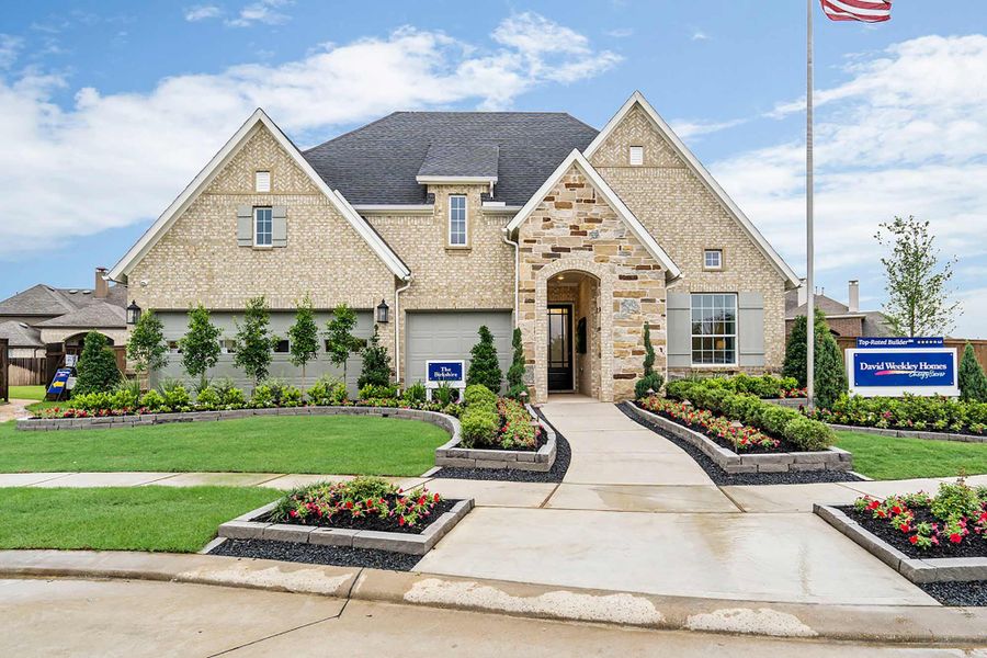 Front exterior of a home in the Cane Island - 60' Homesites community, located in Katy, TX (Image 2).