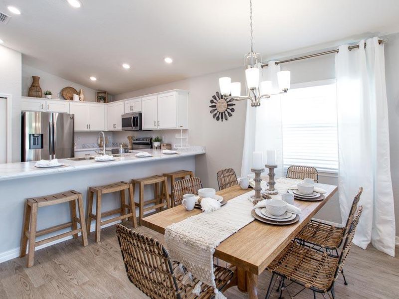 Your new open kitchen is beautifully designed with ample lighting and space - Amaryllis model home in Davenport, FL