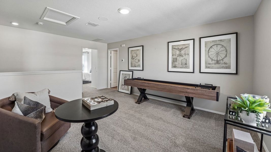 Furnished interior in a model home at Palomino in Manor (Image 28).