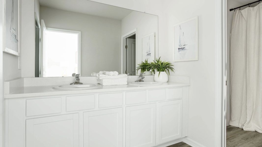 Furnished interior in a model home at Village Oaks in Clearwater (Image 8).