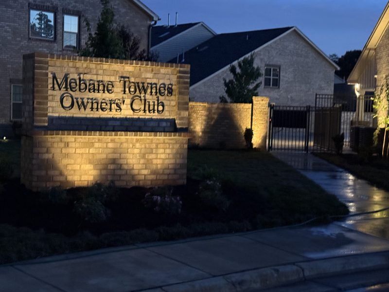 Entrance to the Mebane Towne Center community in Mebane, NC, featuring signage and landscaping (Image 9).