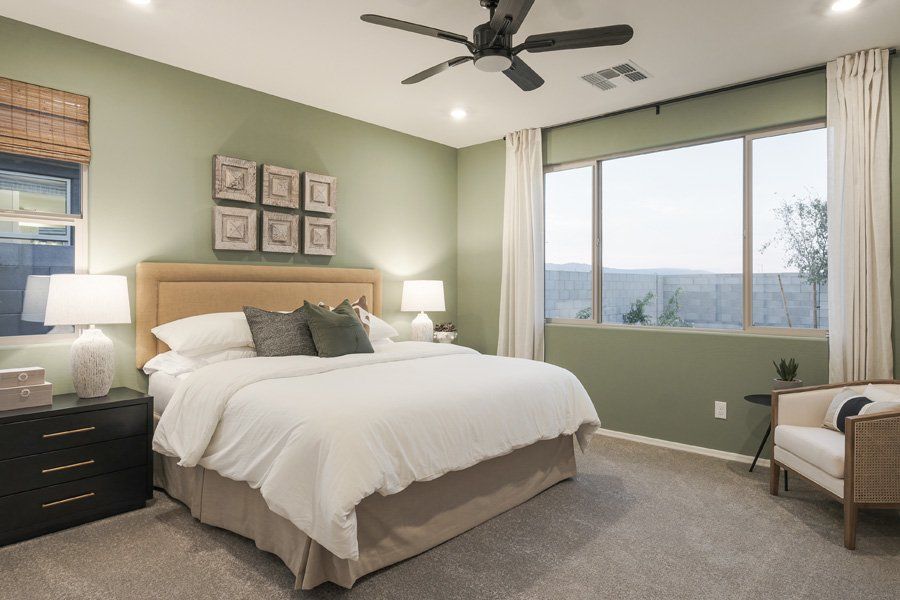 Furnished interior in a model home at Windrose V in Waddell (Image 43).