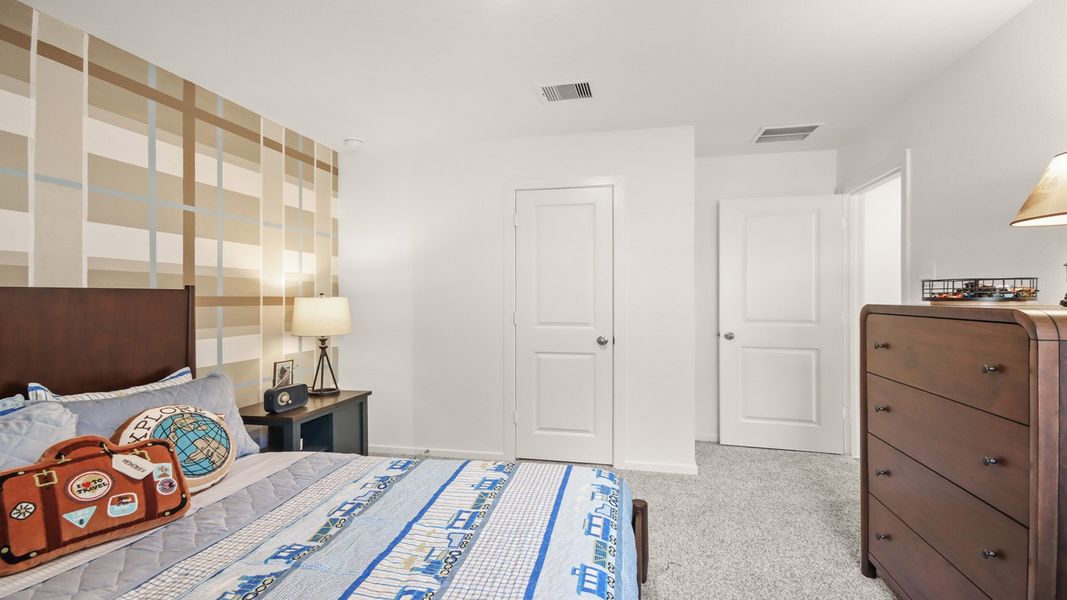 Furnished interior in a model home at New Waverly Station in New Waverly (Image 27).