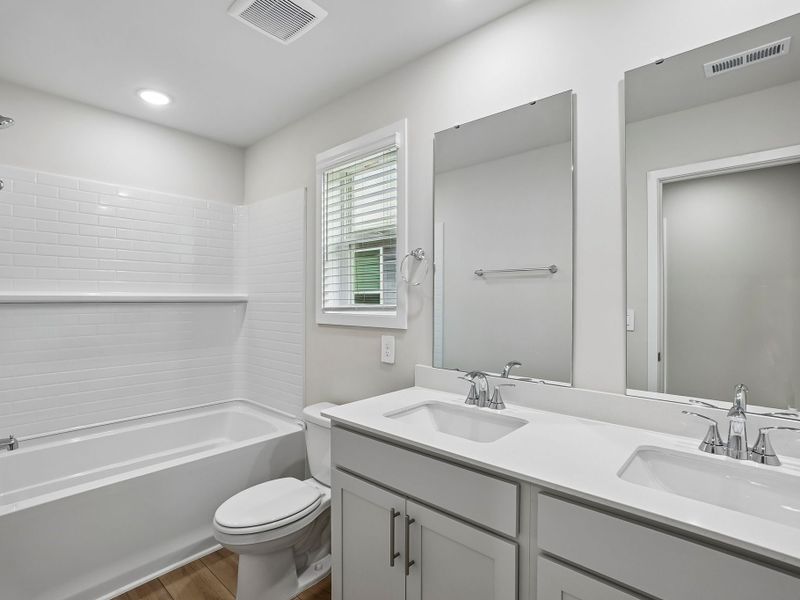 Furnished interior in a model home at Marshburn Landing - Bungalow Series in Wendell (Image 7). Furnished interior in a model home at Marshburn Landing - Bungalow Series in Wendell (Image 7).