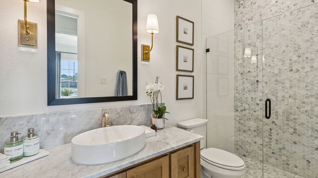 Furnished interior in a model home at The Reserve at Watters in Allen (Image 34).