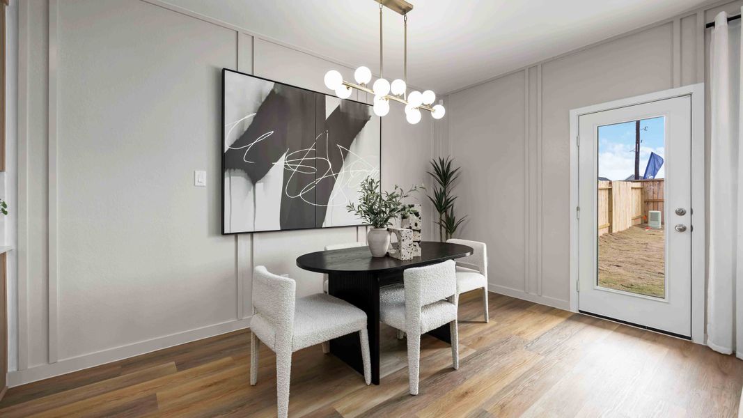 Furnished interior in a model home at Grand West in Houston (Image 9).