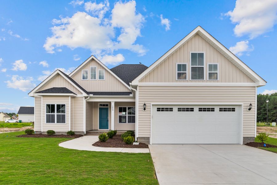 Front exterior of a home in the The Villas at Langston Farms community, located in Winterville, NC (Image 12).