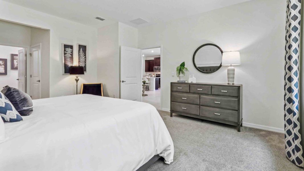 Furnished interior in a model home at Mockingbird Reserve at Winding Oaks in Ocala (Image 12).