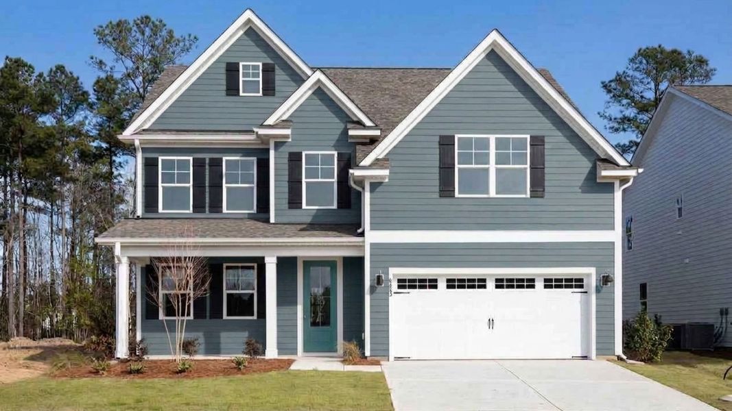 Front exterior of a home in the The Haven at Indigo Preserve community, located in Leland, NC (Image 3). Front exterior of a home in the The Haven at Indigo Preserve community, located in Leland, NC (Image 3).