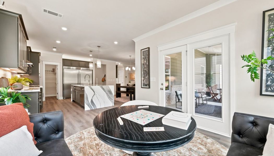 Furnished interior in a model home at Fowler Farms in Auburn (Image 115).