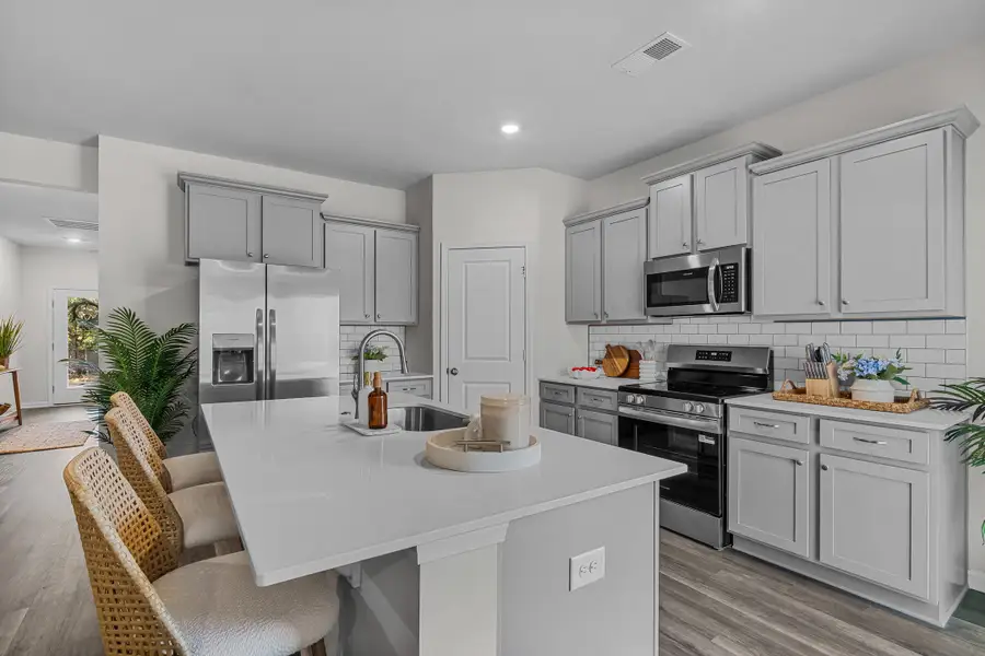 Furnished interior in a model home at Pine Street in Yemassee (Image 7).