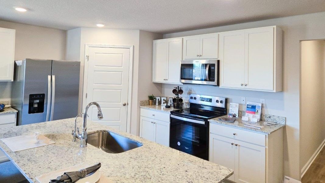 Furnished interior in a model home at The Hammocks in Crawfordville (Image 8). Furnished interior in a model home at The Hammocks in Crawfordville (Image 8).