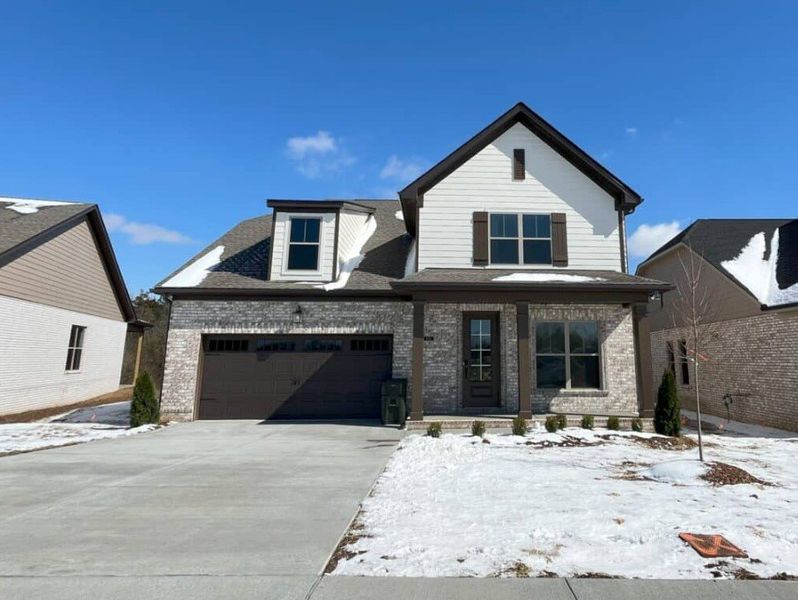 Front exterior of a home in the The Paddock community, located in Gallatin, TN (Image 12).
