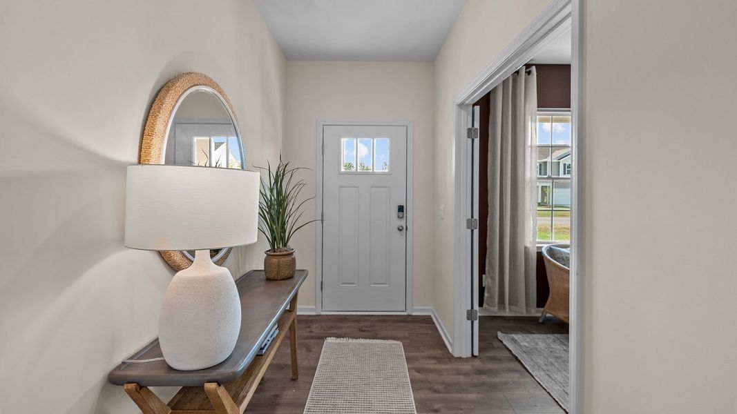 Furnished interior in a model home at The Preserve at Kinsley in Jamestown (Image 2).