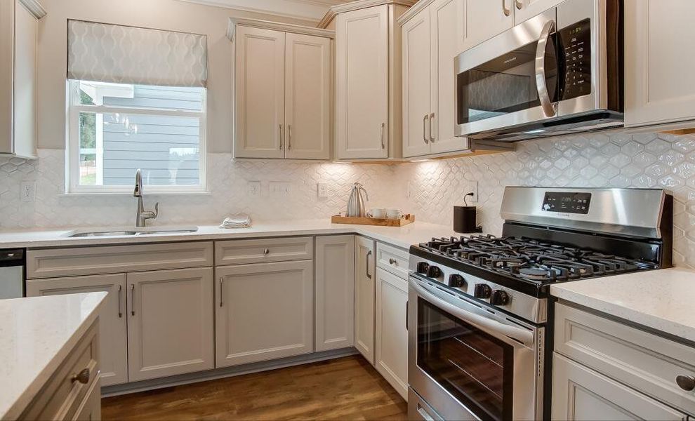 Furnished interior in a model home at Bryton Crossing Townhomes in Huntersville (Image 13). Furnished interior in a model home at Bryton Crossing Townhomes in Huntersville (Image 13).