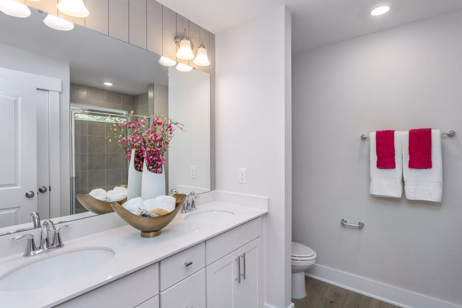 Furnished interior in a model home at Running Brook Townes in Durham (Image 22).