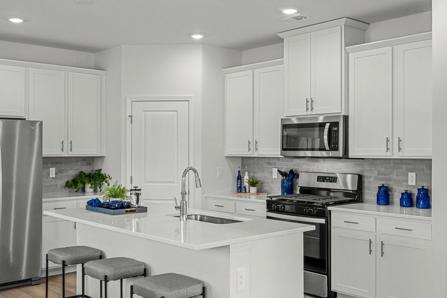 Furnished interior in a model home at Waterside - Boardwalk Series in Longs (Image 7).