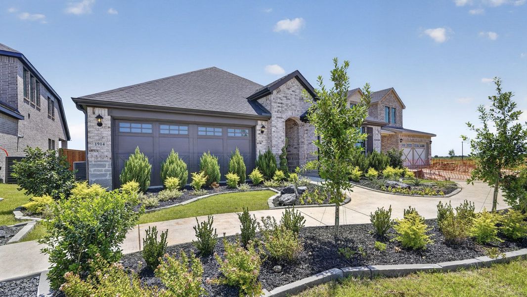 Front exterior of a home in the Windchime community, located in Celina, TX (Image 15). Front exterior of a home in the Windchime community, located in Celina, TX (Image 15).