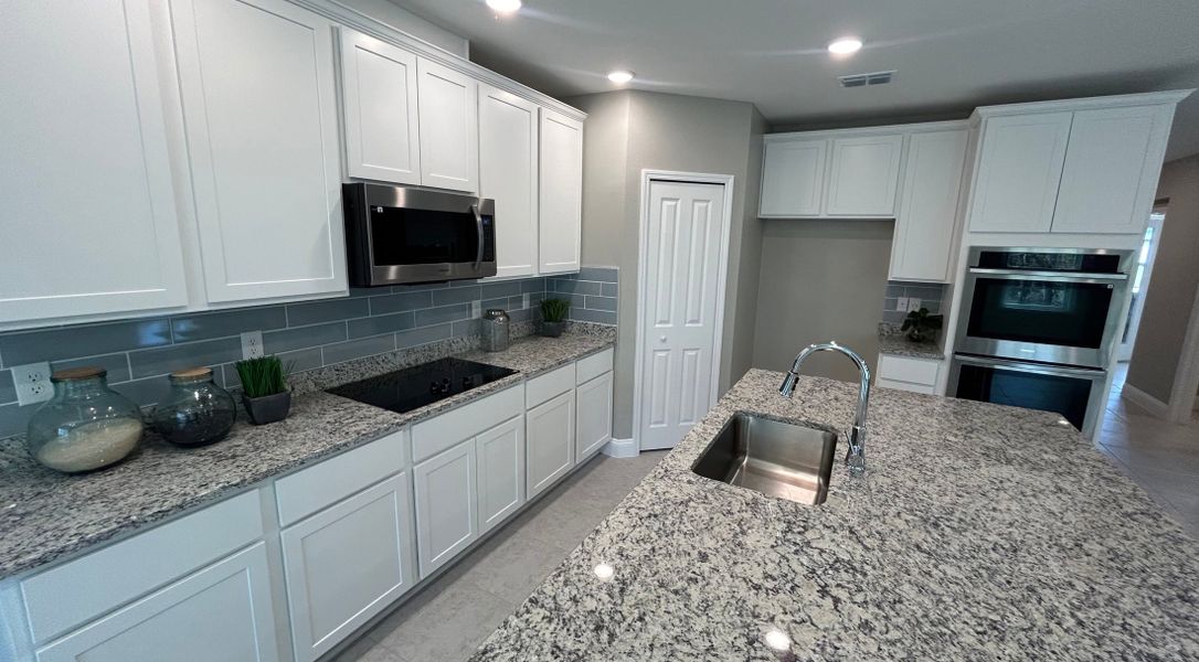 Furnished interior in a model home at Creekside Landing in Callahan (Image 4).
