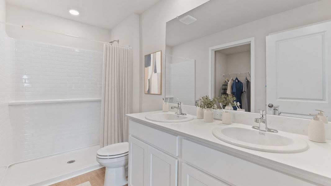 Furnished interior in a model home at Asher Park in Lehigh Acres (Image 56).