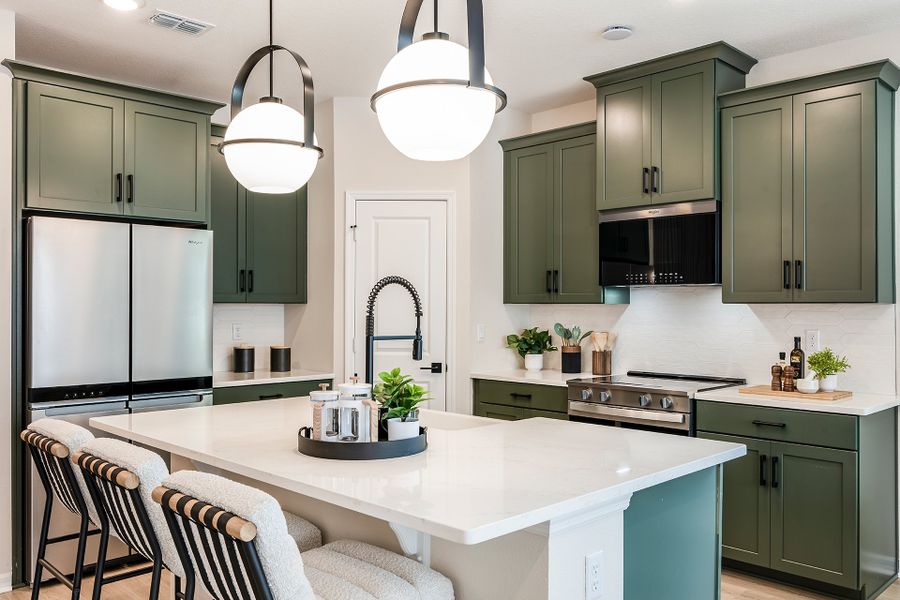 Furnished interior in a model home at Aulin Square in Oviedo (Image 4).