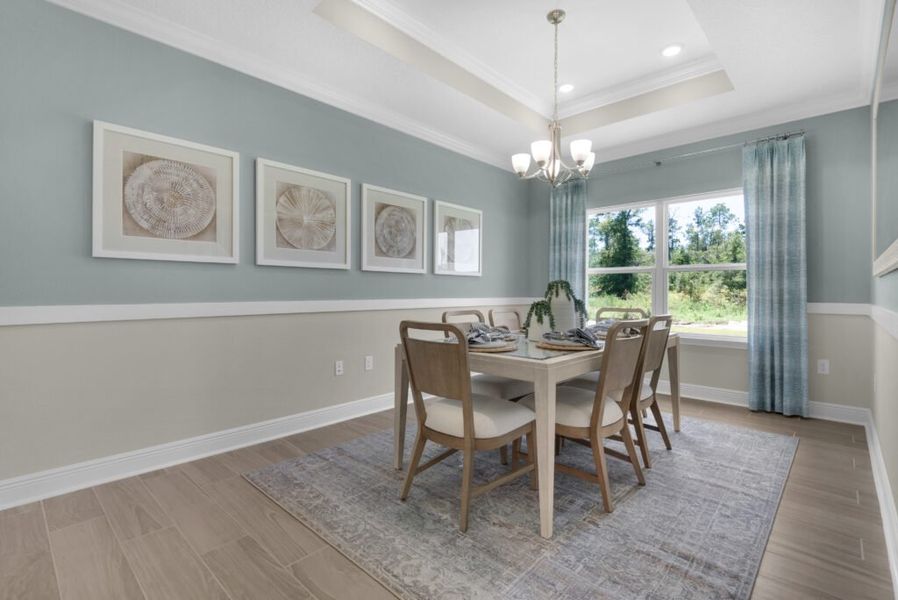 Furnished interior in a model home at Lake Merial in Panama City (Image 12).