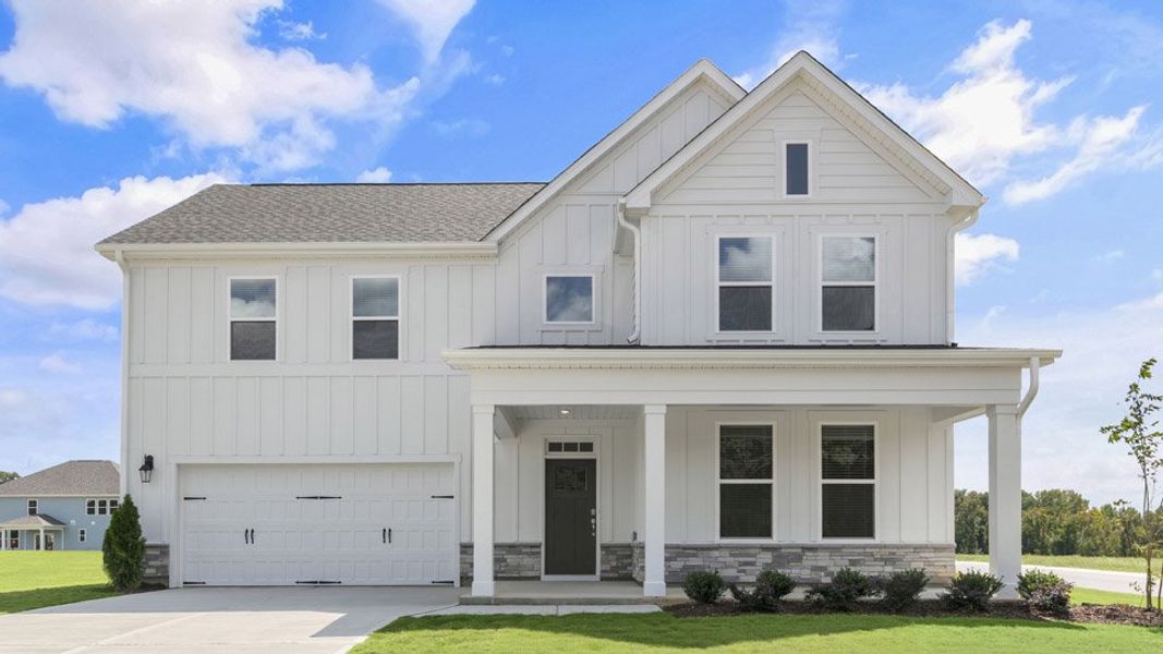 Front exterior of a home in the Eagle Creek community, located in Fuquay Varina, NC (Image 1).