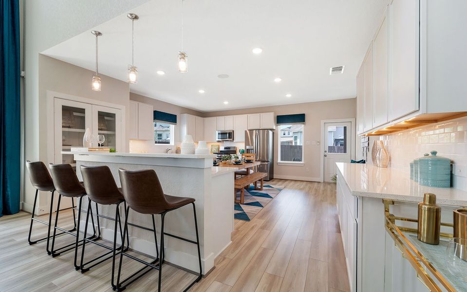 Furnished interior in a model home at Hunter's Ranch in San Antonio (Image 8).