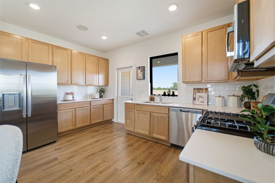 Furnished interior in a model home at Lone Oak in San Antonio (Image 23).
