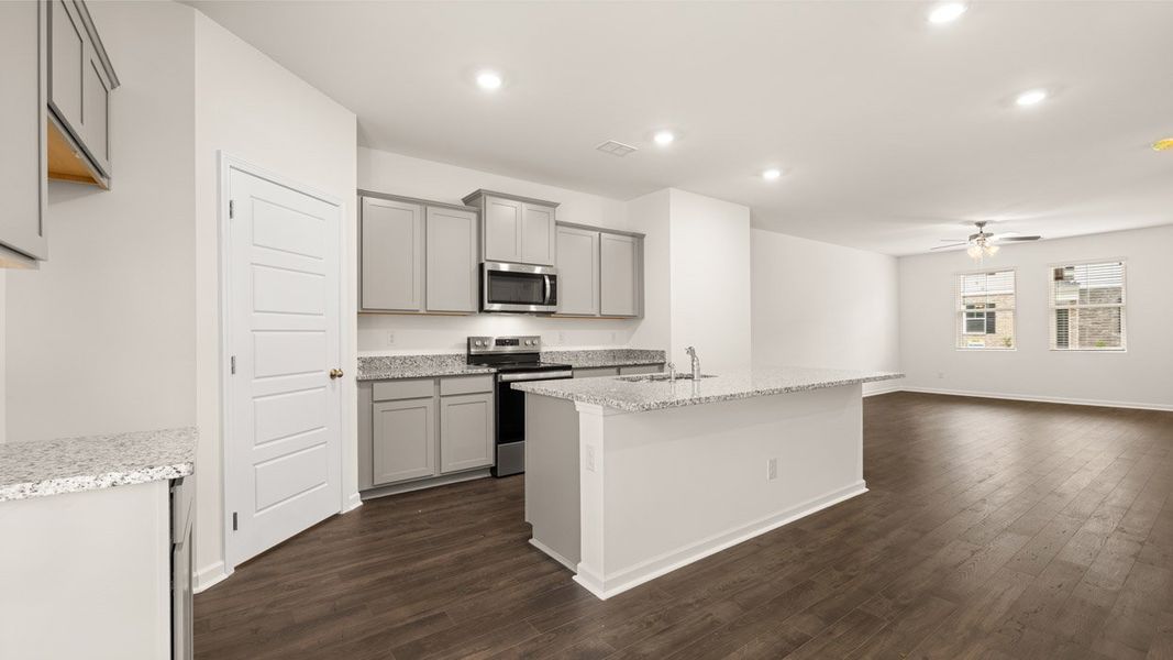 Furnished interior in a model home at Inverness at Sugarloaf in Lawrenceville (Image 12).