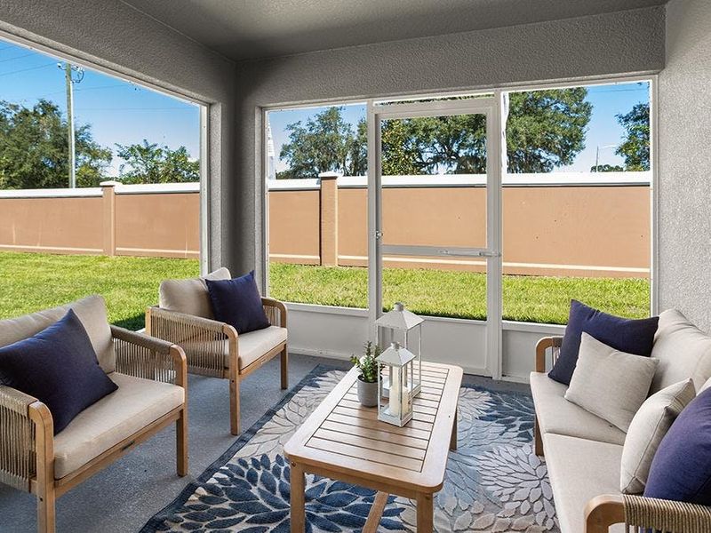 Your living space extends outdoors to a covered lanai - Parker model home in Lakeland, FL