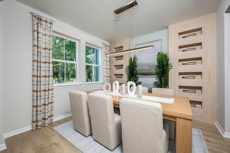 Furnished interior in a model home at Aulin Square in Oviedo (Image 10).