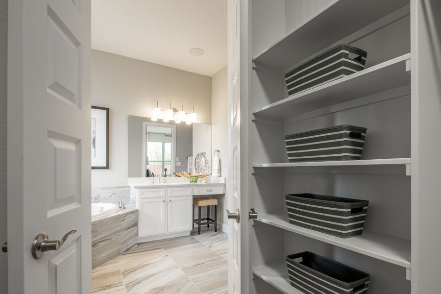 Furnished interior in a model home at Oaks at San Gabriel in Georgetown (Image 21).