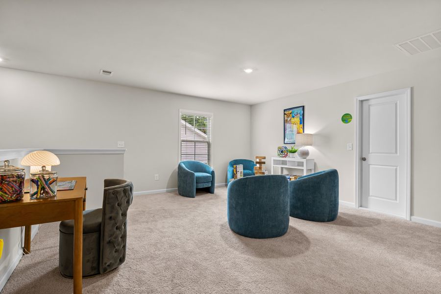 Furnished interior in a model home at Harmon Terrace in Hopkins (Image 15).