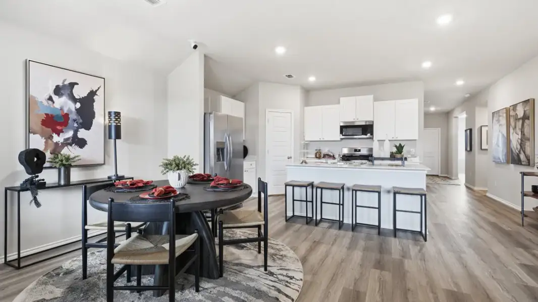 Furnished interior in a model home at Hadley Farms in Godley (Image 6).