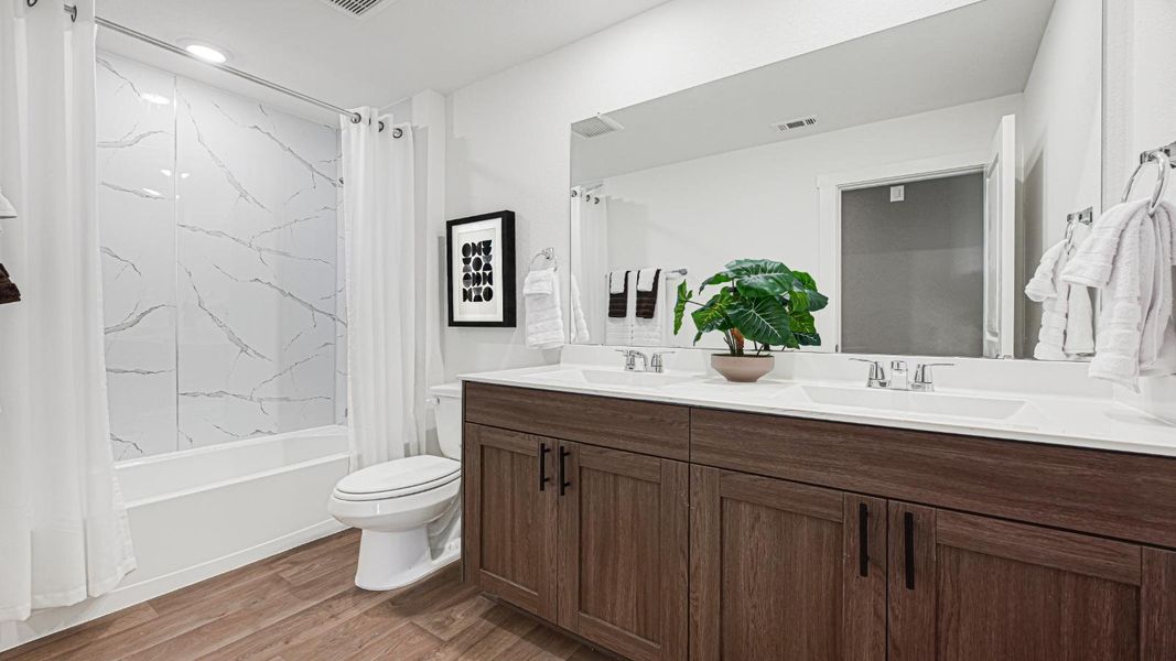 Furnished interior in a model home at Westward Pointe in Sealy (Image 27).