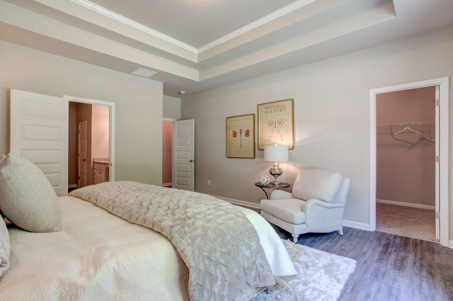 Furnished interior in a model home at Legends at Old Monroe in Monroe (Image 35).