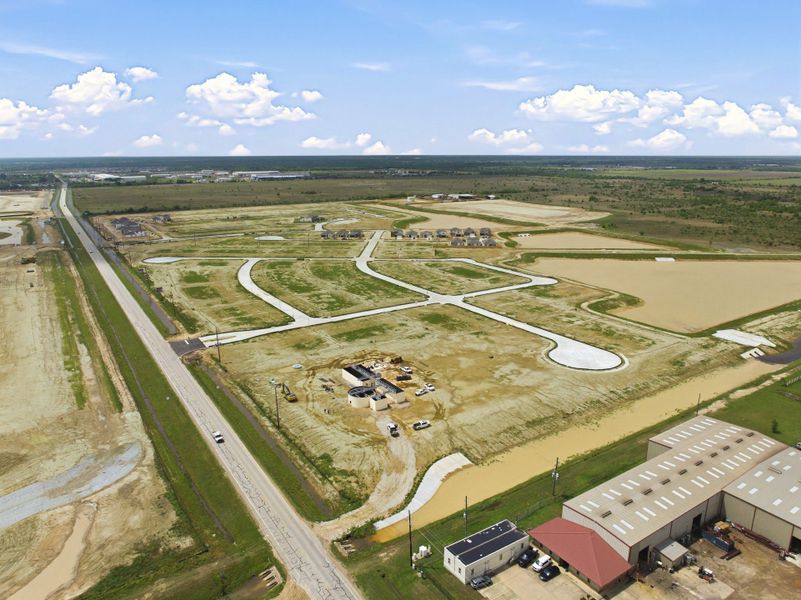 A large open field with many buildings.