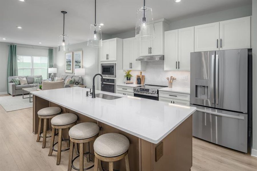 Furnished interior in a model home at Windsong Townhomes in Gallatin (Image 5).