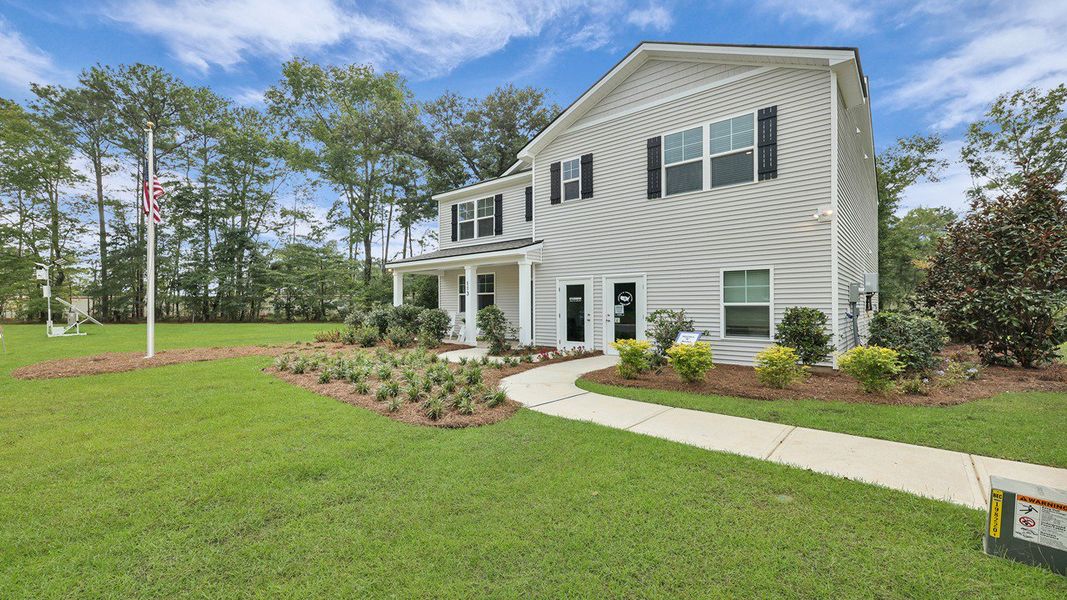 Front exterior of a home in the The Cove at Mallard Crossing community, located in Summerville, SC (Image 2).