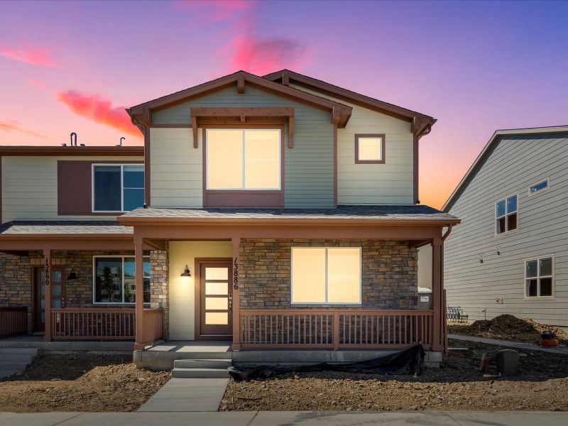 Exterior of the Woodland floorplan at a Meritage Homes community in Broomfield, CO.