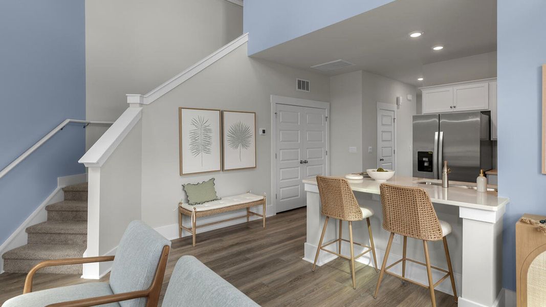 Furnished interior in a model home at The Palms at Indigo Preserve Townhomes in Leland (Image 17).