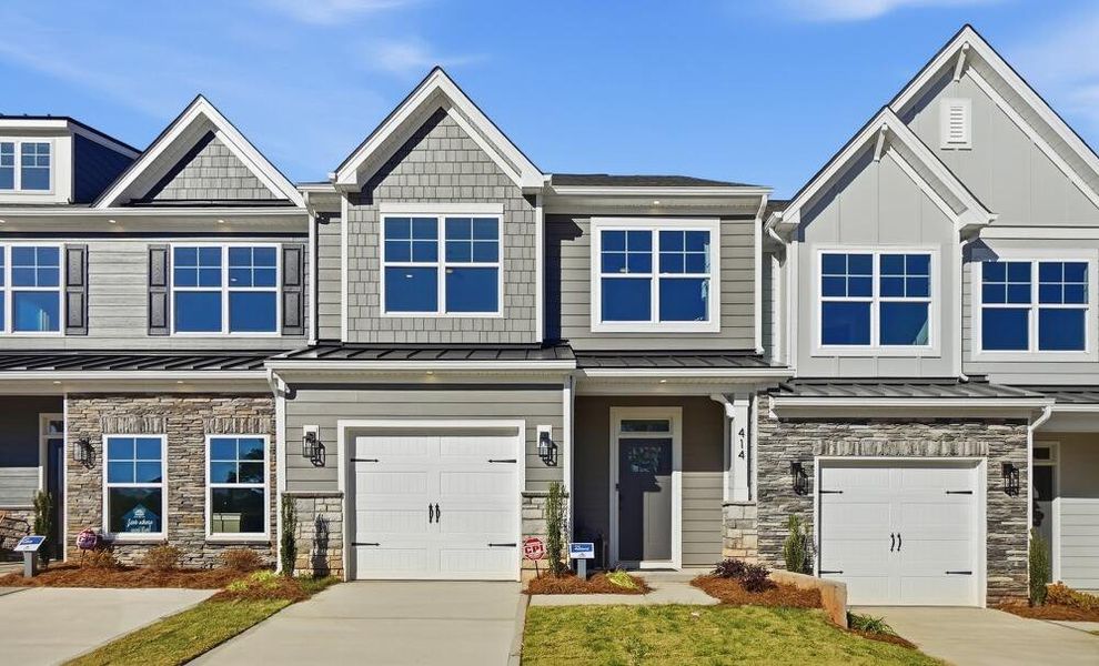 Front exterior of a home in the Blythe Mill Townhomes community, located in Waxhaw, NC (Image 12). Front exterior of a home in the Blythe Mill Townhomes community, located in Waxhaw, NC (Image 12).