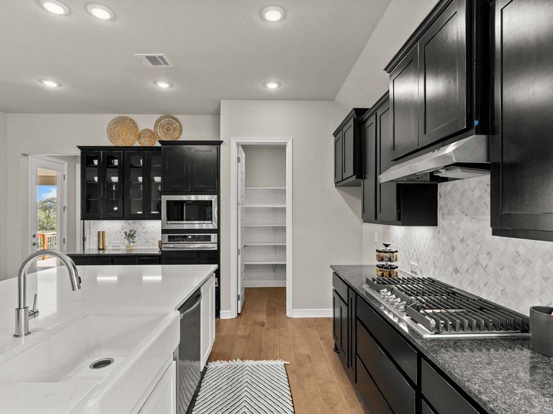 Furnished interior in a model home at Potranco Oaks in Castroville (Image 19).